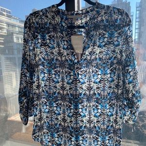 Never worn daniel rain top!